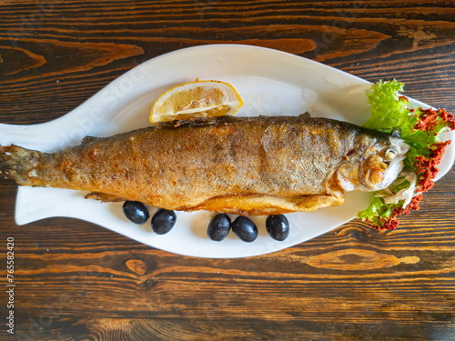 Smoked mountain trout on the table