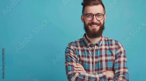 Smiling confident young bearded handsome man hipster wear shirt glasses © ORG