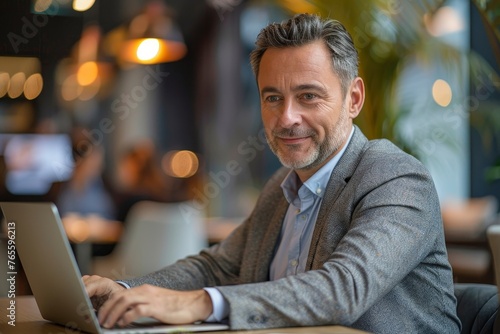 Successful business man using a laptop in a meeting with his colleague  Generative AI