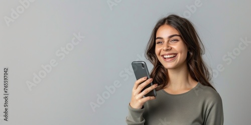 Smiling business woman talking on the phone Horizontal banner on the studio wall