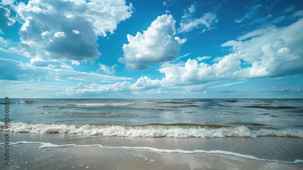 calm blue baltic sea against a blue sky with white cirrus clouds and an empty sandy beach - obrazy, fototapety, plakaty 