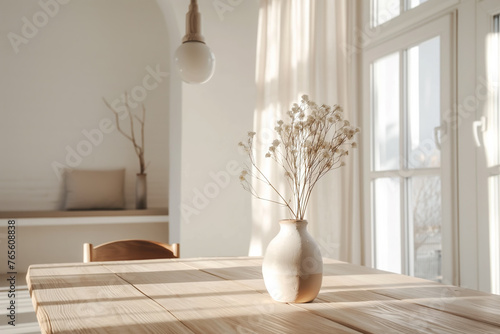 Sunny Minimalist Dining. Vase with Dried Flowers on a Wooden Table. Serene Morning Light. A Peaceful Dining Room Scene with Natural Accents