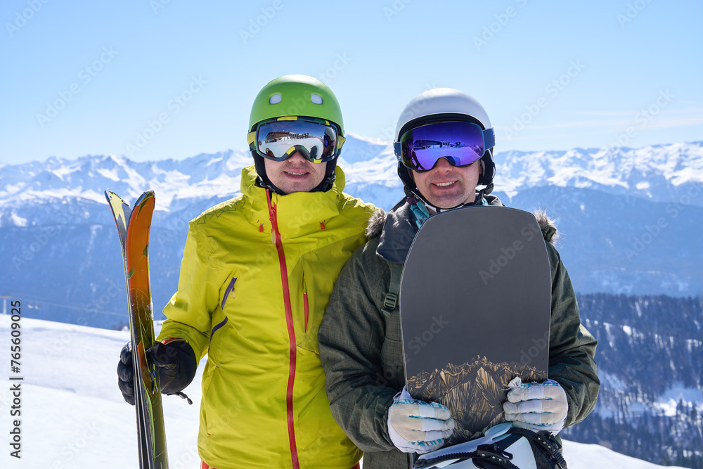Skiing and Snowboarding Buddies on Alpine Slope