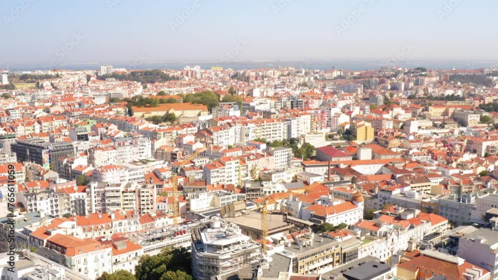 Aerial Tilt Down Scenic View Of Residential Buildings In City Against Clear Sky, Drone Flying Forward On Sunny Day - Lisbon, Portugal Aerial Tilt Down Scenic View Of Residential Buildings In City Against Clear Sky, Drone Flying Forward On Sunny Day - Lisbon, Portugal