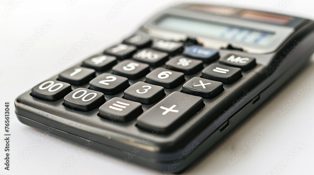 A black calculator appears isolated on a white background - obrazy, fototapety, plakaty 