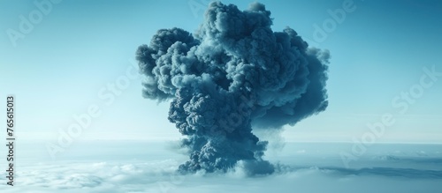 A large plume of smoke rises from a cloud of smoke, creating a dramatic scene.