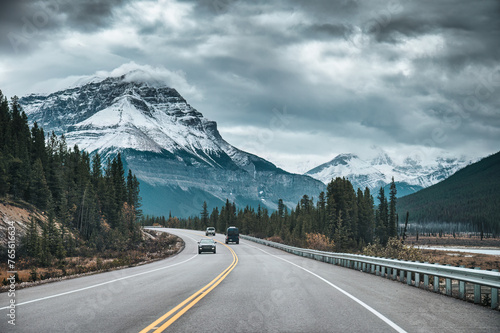 Road trip among rocky mountains in the forest on gloomy at Banff national park, Canada