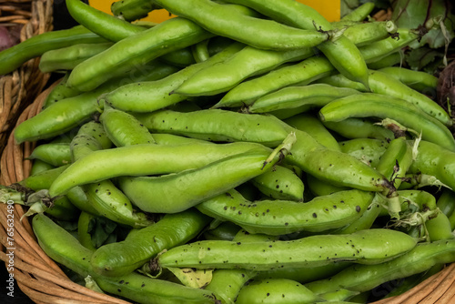 Organic broadbeans in a basket at a farmer's market photo