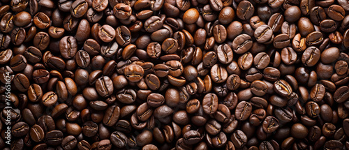 Roasted dark brown coffee beans with a pleasant aroma  texture for background.