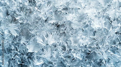 Background texture of ice crystals on a frozen window. photo