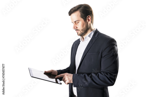 A businessman in a suit using a digital tablet, isolated on a white background, depicting modern technology at work