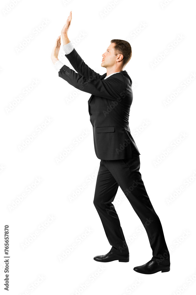 A businessman in a black suit posing with hands raised against a white isolated background, representing a concept of achievement and success A businessman in a black suit posing with hands raised against a white isolated background, representing a concept of achievement and success