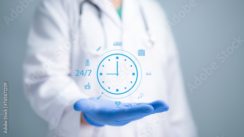 Medical worker holding 24-7 service icon for assistance patient when accident or emergency. Medical call center service with out interruption day and night. Pharmacy service 24 hours a day.