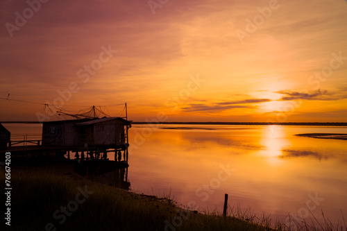 sunset at Pialassa Baiona near Marina Romean (Italy) photo