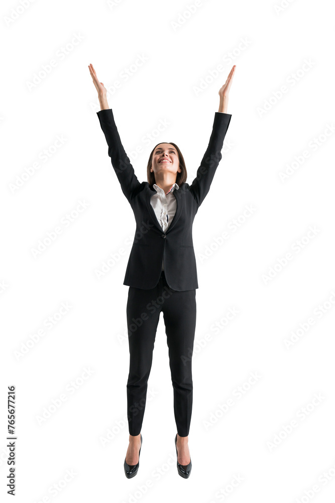A businesswoman in a suit with her hands raised up in a gesture of success, isolated on a white background, expressing happiness and victory A businesswoman in a suit with her hands raised up in a gesture of success, isolated on a white background, expressing happiness and victory