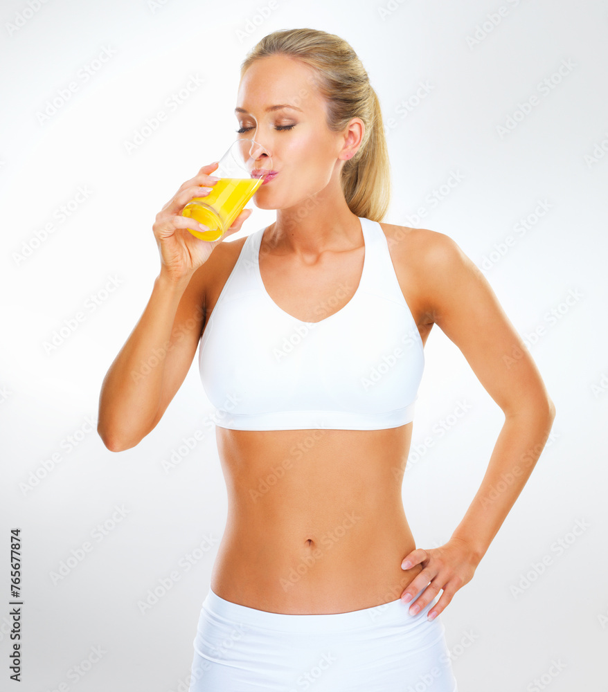 Studio, drink and portrait of woman with orange juice for health, vitamin c or weight loss. Underwear, glass and person with citrus beverage for wellness, nutrition or diet on white background Studio, drink and portrait of woman with orange juice for health, vitamin c or weight loss. Underwear, glass and person with citrus beverage for wellness, nutrition or diet on white background