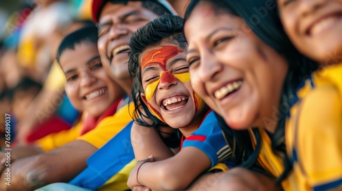 A Latinx family cheers on their youngest member at a soccer game, their faces painted with team colors, radiating pure joy and support.