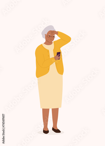 One Black Elderly Woman Looking At Her Cellphone With Worried Face And Hand On Forehead. Full Length.