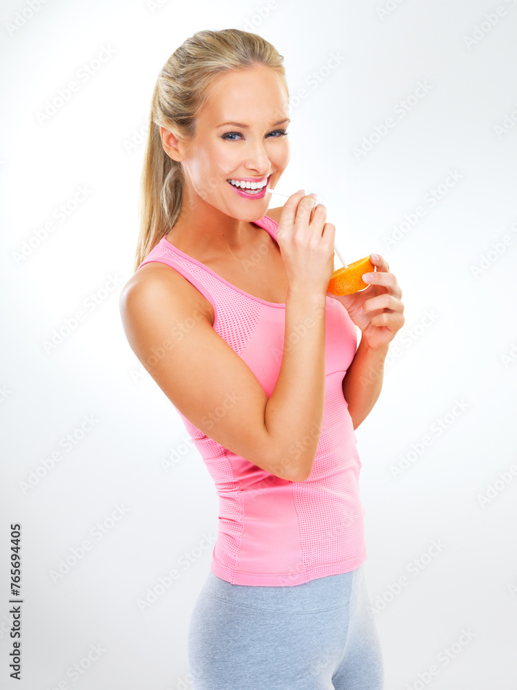 Woman, portrait and orange fruit with straw for lose weight nutrition or vitamin c fiber, drink or white background. Female person, face and diet wellness in studio or self care, breakfast or mockup