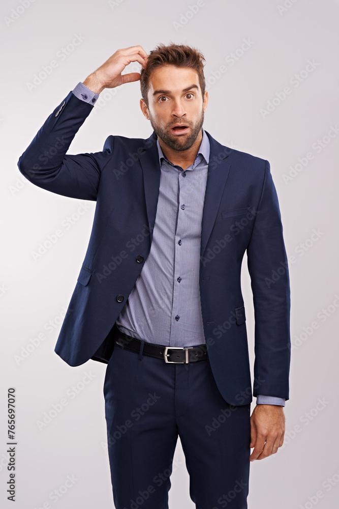 Confused, businessman and studio portrait thinking, puzzled employee with idea for question. Professional, wondering expression for corporate job, formal and scratching head on isolated background Confused, businessman and studio portrait thinking, puzzled employee with idea for question. Professional, wondering expression for corporate job, formal and scratching head on isolated background