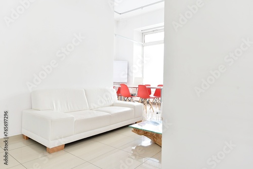 white office with red chairs
