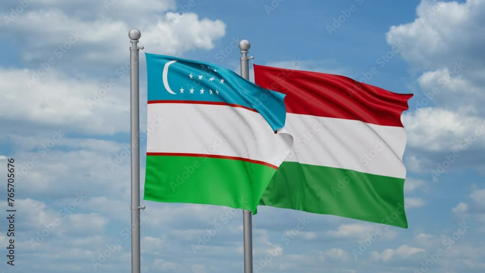 Hungary and Uzbekistan two flags waving together, looped video, two country relations concept Hungary and Uzbekistan two flags waving together, looped video, two country relations concept