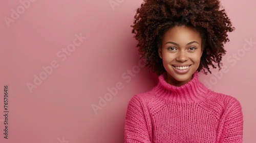 Smiling Woman in Pink Sweater