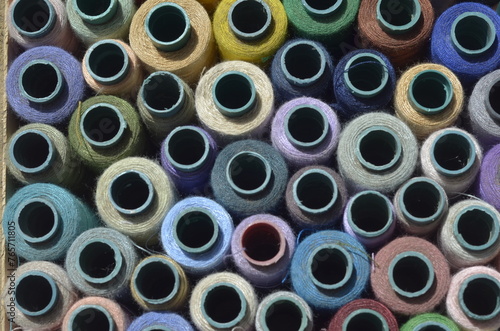 Collection of Sewing Threads as Multicolored Background