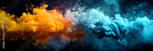Colorful blue and yellow smoke merging and swirling while flowing on black background. © Melvillian