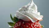 Strawberry with whipped cream on top over blurred sweet dessert background