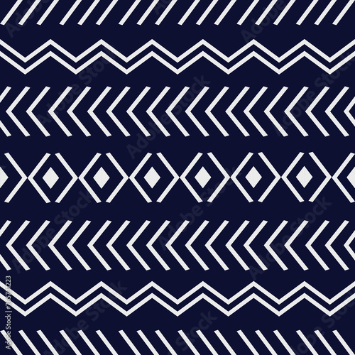 Zigzag seamless pattern in indigo color background. Geometric ikat style for design, wallpaper, printout, fabric and embroidery.