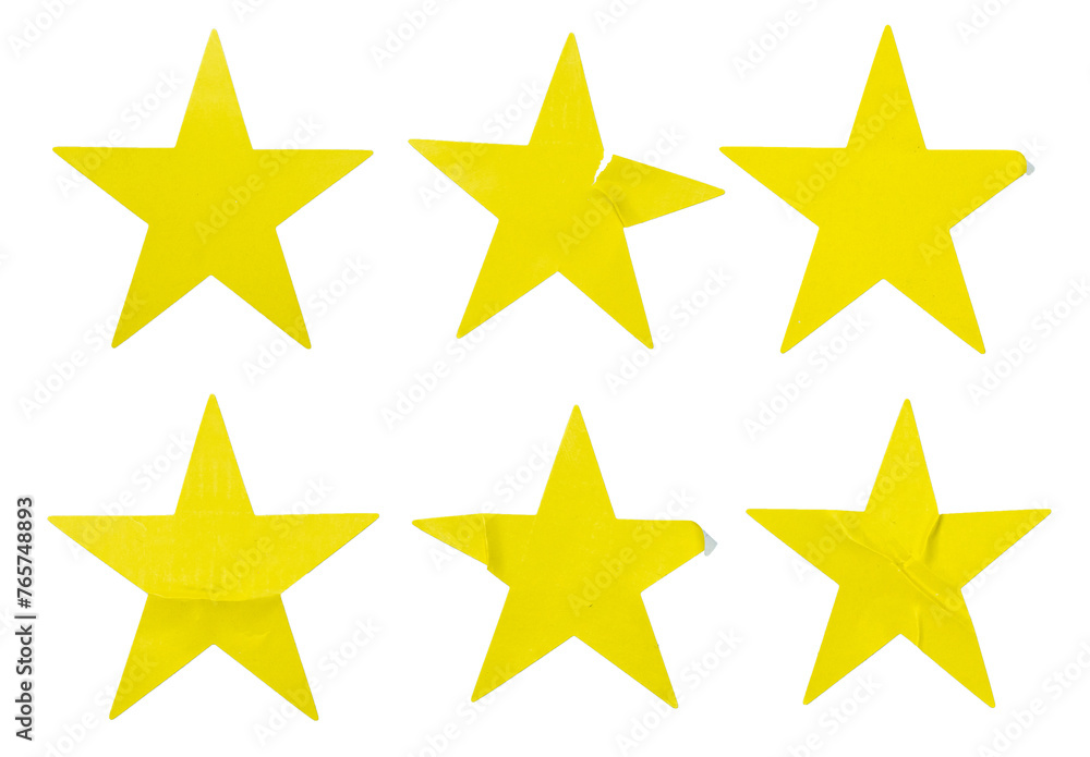 A set of yellow star shape paper sticker label isolated on white background. A set of yellow star shape paper sticker label isolated on white background.