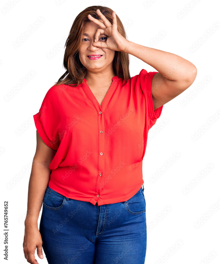 Middle age latin woman wearing casual clothes smiling happy doing ok sign with hand on eye looking through fingers Middle age latin woman wearing casual clothes smiling happy doing ok sign with hand on eye looking through fingers