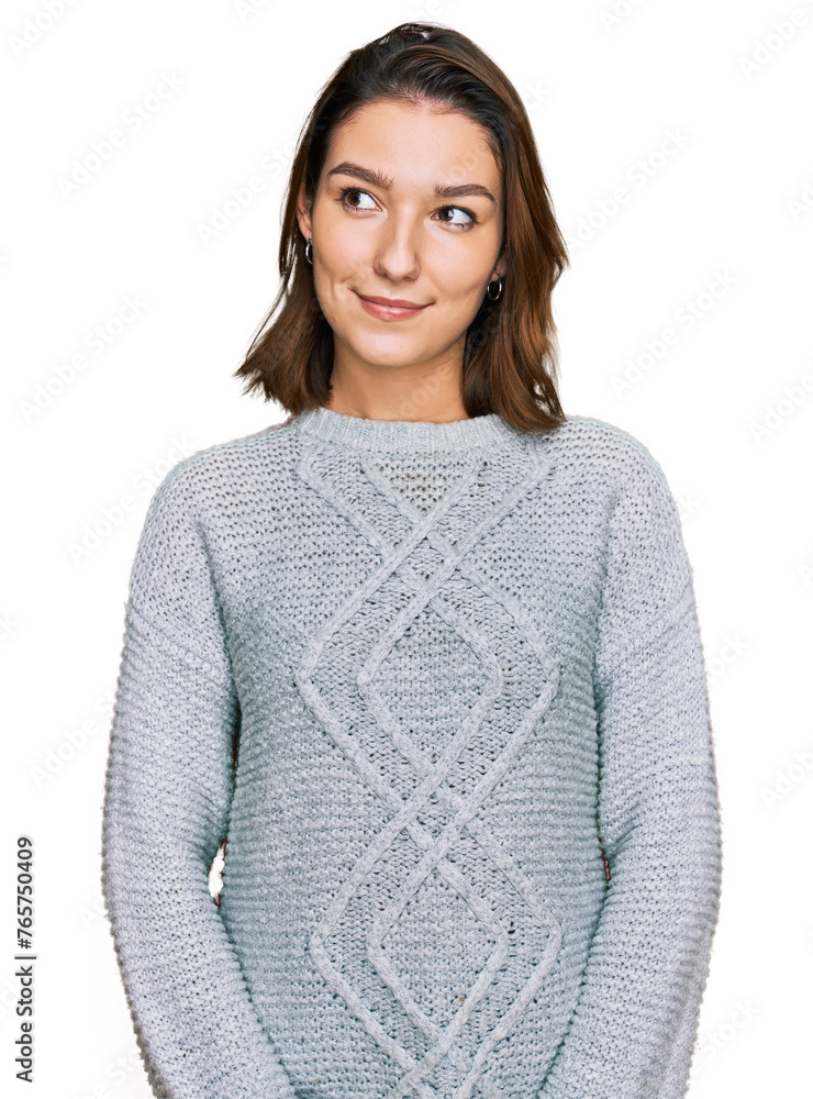 Young caucasian girl wearing casual clothes smiling looking to the side and staring away thinking. Young caucasian girl wearing casual clothes smiling looking to the side and staring away thinking.