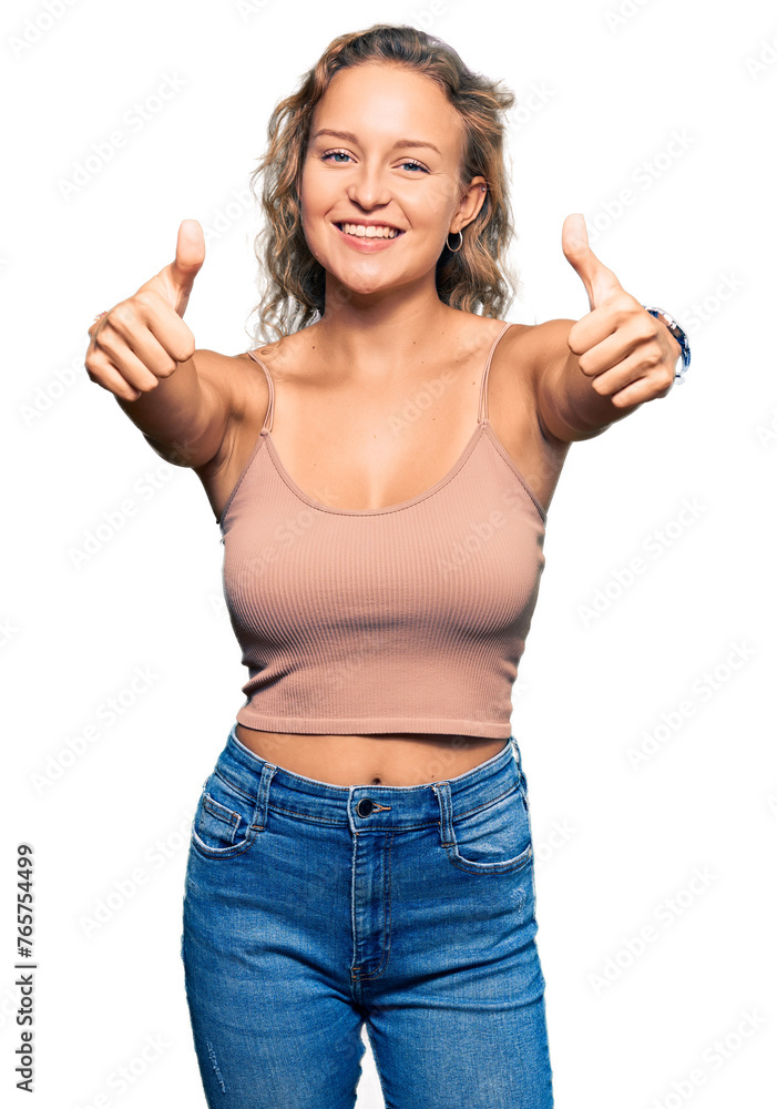 Beautiful caucasian woman wearing casual clothes approving doing positive gesture with hand, thumbs up smiling and happy for success. winner gesture. Beautiful caucasian woman wearing casual clothes approving doing positive gesture with hand, thumbs up smiling and happy for success. winner gesture.