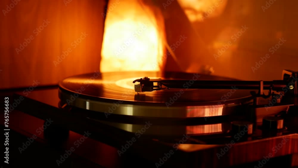 Retro vinyl player with a rotating record. Retro vinyl player with a rotating record.