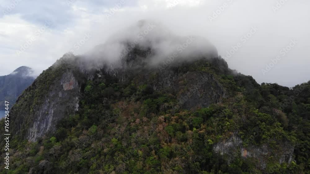 Mountain of stone in cloud, aerial view Mountain of stone in cloud, aerial view