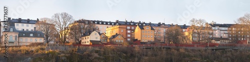 Old 1700s houses at the board walk vista point Monteliusvägen on the hill Mariaberget in the district Södermalm, a sunny winter day in Stockholm