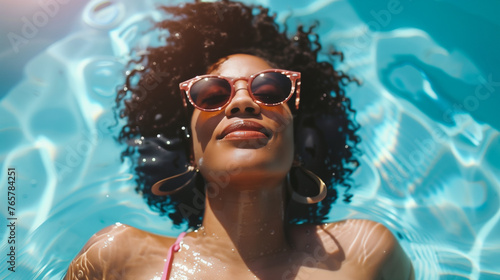 black woman in swimming pool © Erzsbet