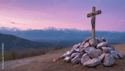 A wooden cross on a pile of rocks