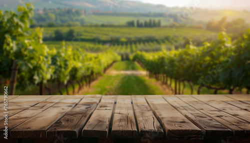 Empty wooden table for product display with blurred Italian vineyards and cypresses in the background photo