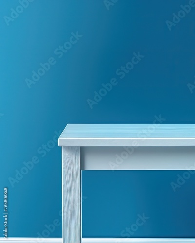 photo of clean white table close up blue room on background