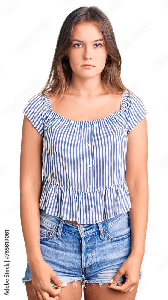 Obraz premium Beautiful caucasian woman wearing casual clothes with serious expression on face. simple and natural looking at the camera.