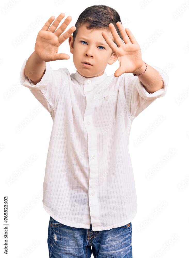 Cute blond kid wearing elegant shirt doing frame using hands palms and fingers, camera perspective Cute blond kid wearing elegant shirt doing frame using hands palms and fingers, camera perspective