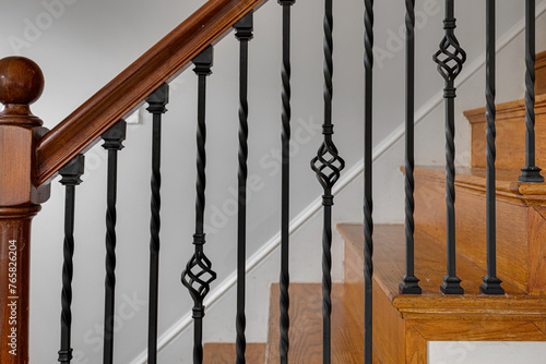 Konstfotografi Classic Elegant Wooden Staircase with Intricate Wrought Iron Balusters, Wood Rai