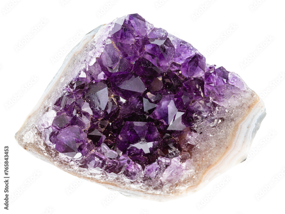 close up of sample of natural stone from geological collection - rough geode of amethyst crystals isolated on white background close up of sample of natural stone from geological collection - rough geode of amethyst crystals isolated on white background
