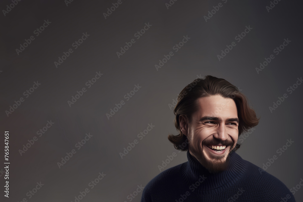Obraz premium Heartwarming Chuckle - Man in Navy Sweater with Copy Space