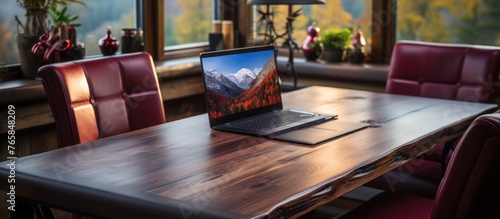 elegant luxury workplace. Modern computer, black leather mousepad on wooden table