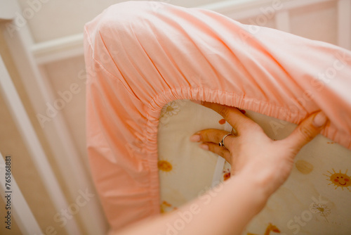 Fotografie kid`s mattress with fitted sheet