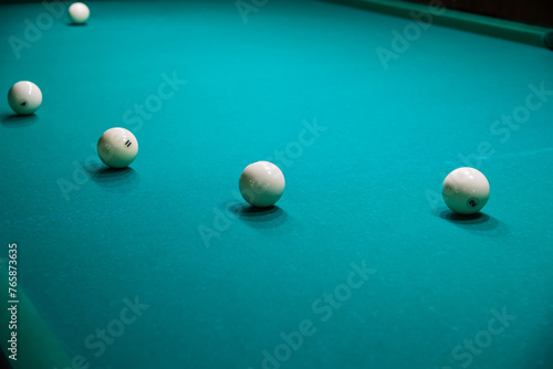 Sports game of billiards on a green cloth